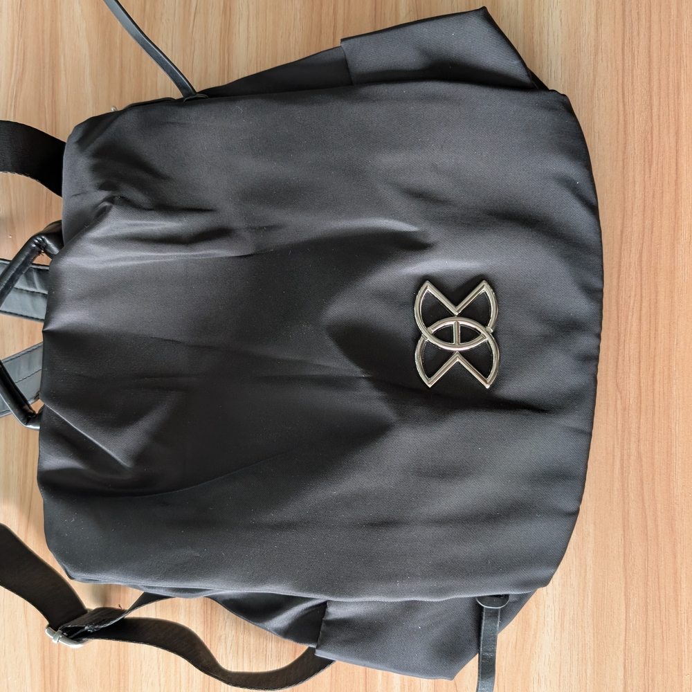Black Backpack with Silver Logo